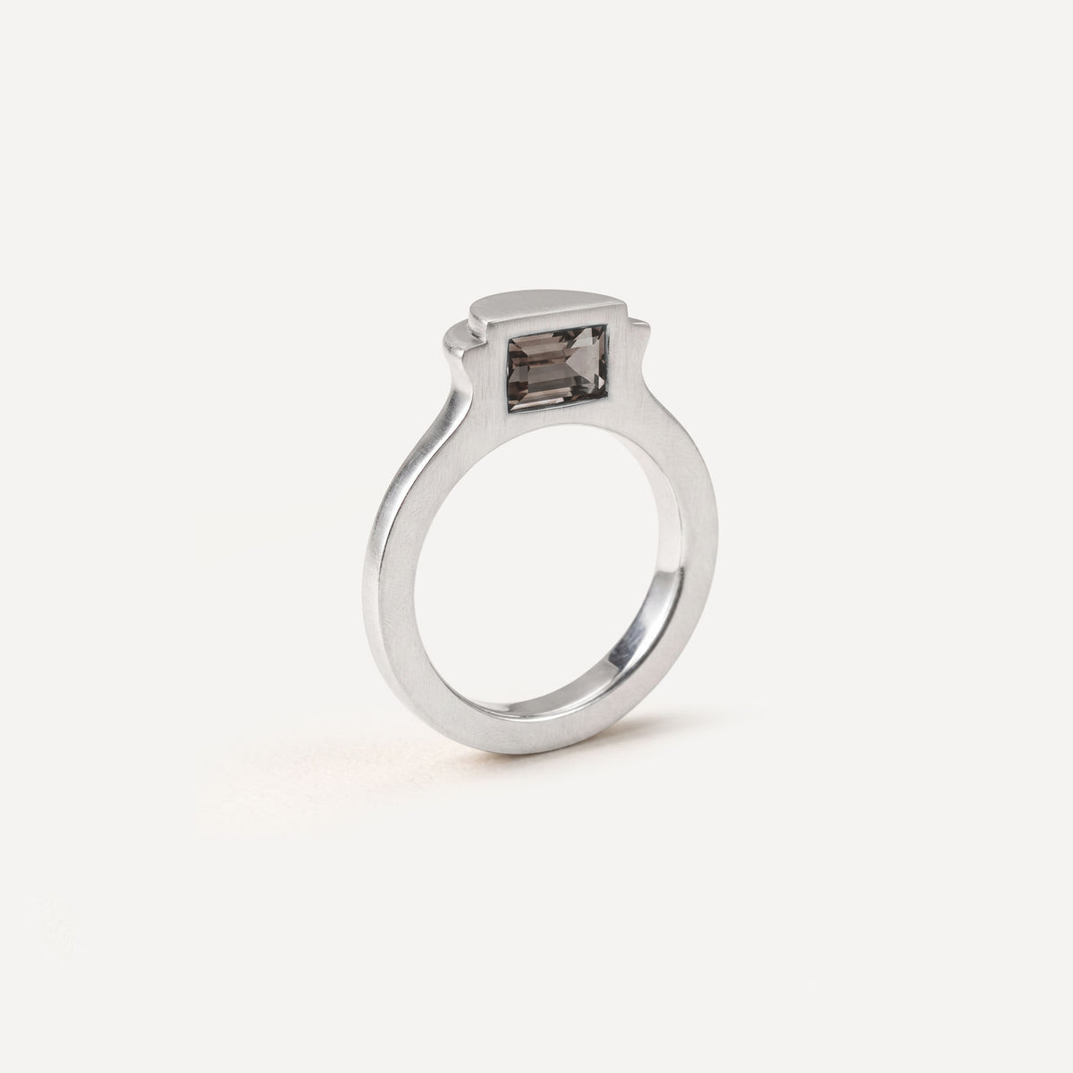 Silver signet ring with Smoky Quartz on the side in 1 half of the ring.
