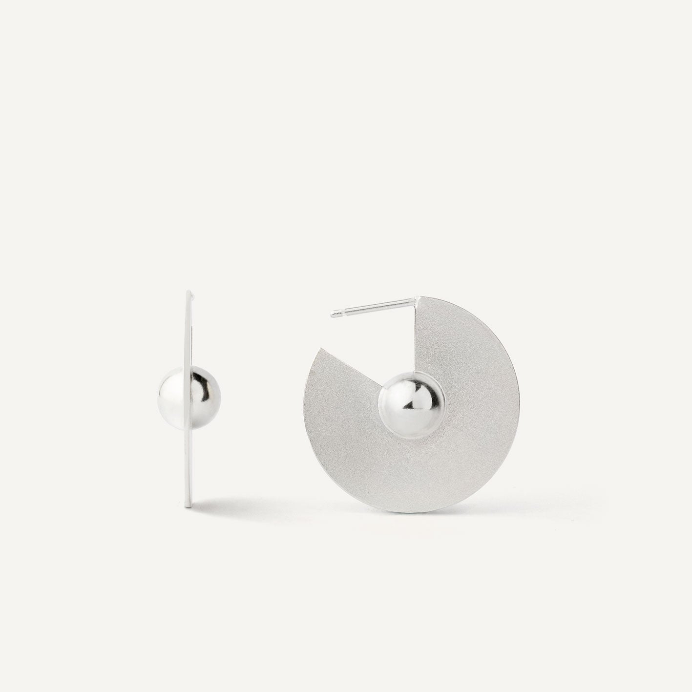 My version of silver hoops that embody simplicity and modernity — perfect for every day, when every day is special.
These earrings are about mental stillness, not silence. About focus without force. About this moment when you feel that you know without any doubts.