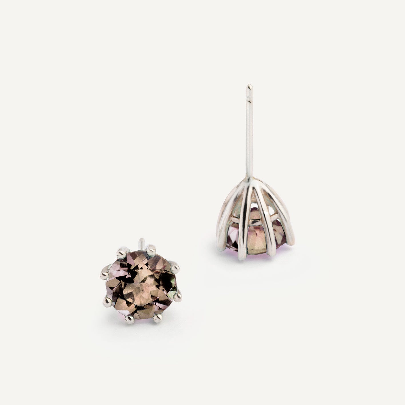 A pair of silver earrings featuring Smoky Quartz, designed to be worn every day. Handmade in Barcelona.