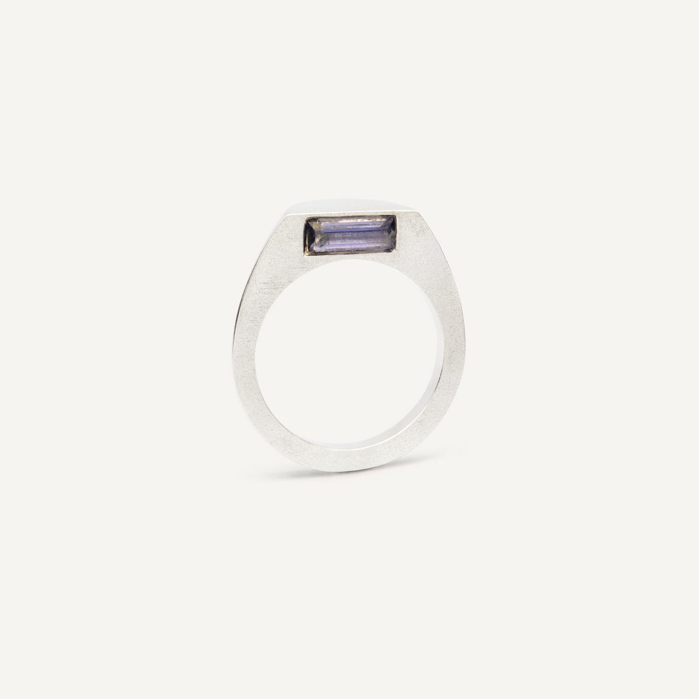 This silver signet ring is made of 2 parts. When it’s closed, it looks as if nothing’s happening. But when you open it — surprise — a hidden garden of gemstones inside.