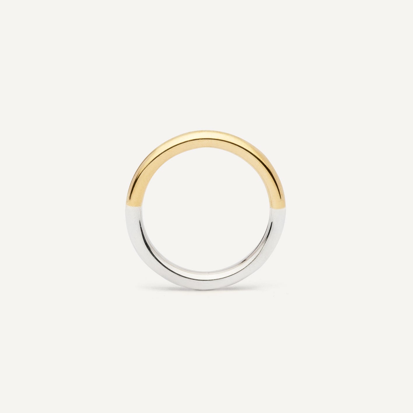 A wedding ring made out of 2 types of gold -18K Yellow and 18K White, symbolizing the union of two different people. Handmade jewelry piece. 