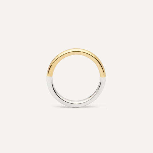 A wedding ring made out of 2 types of gold -18K Yellow and 18K White, symbolizing the union of two different people. Handmade jewelry piece. 