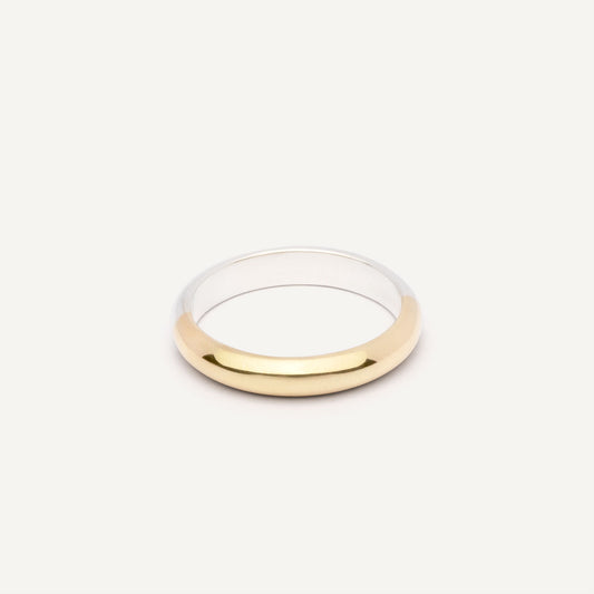 A wedding ring made out of 2 types of gold -18K Yellow and 18K White, symbolizing the union of two different people. Handmade jewelry piece. 
