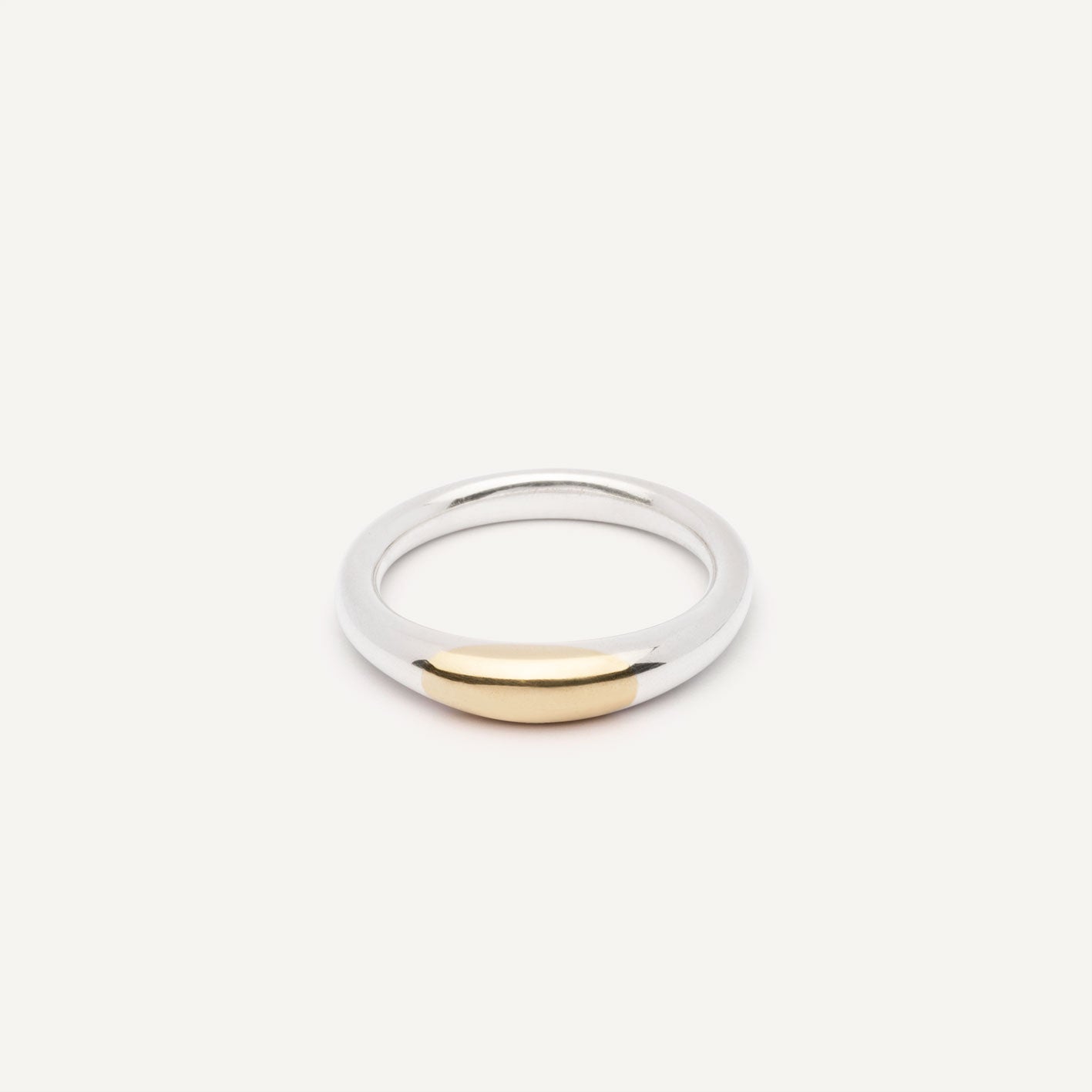 A wedding ring made out of 2 types of gold -18K Yellow and 18K White, symbolizing the union of two different people. Handmade jewelry piece. 