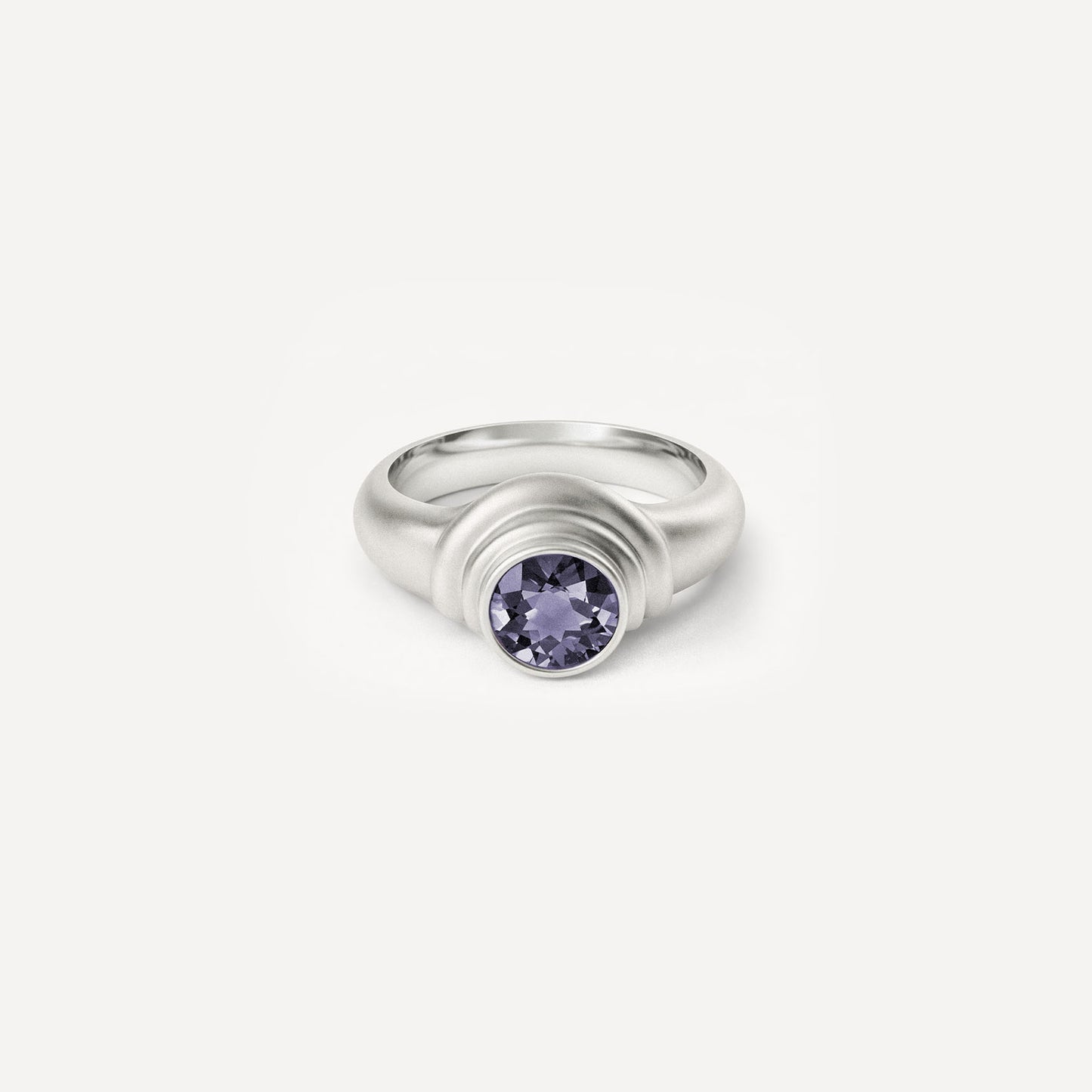Silver 2/3 ring with Iolite. 