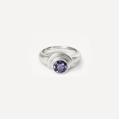 Silver 2/3 ring with Iolite. 