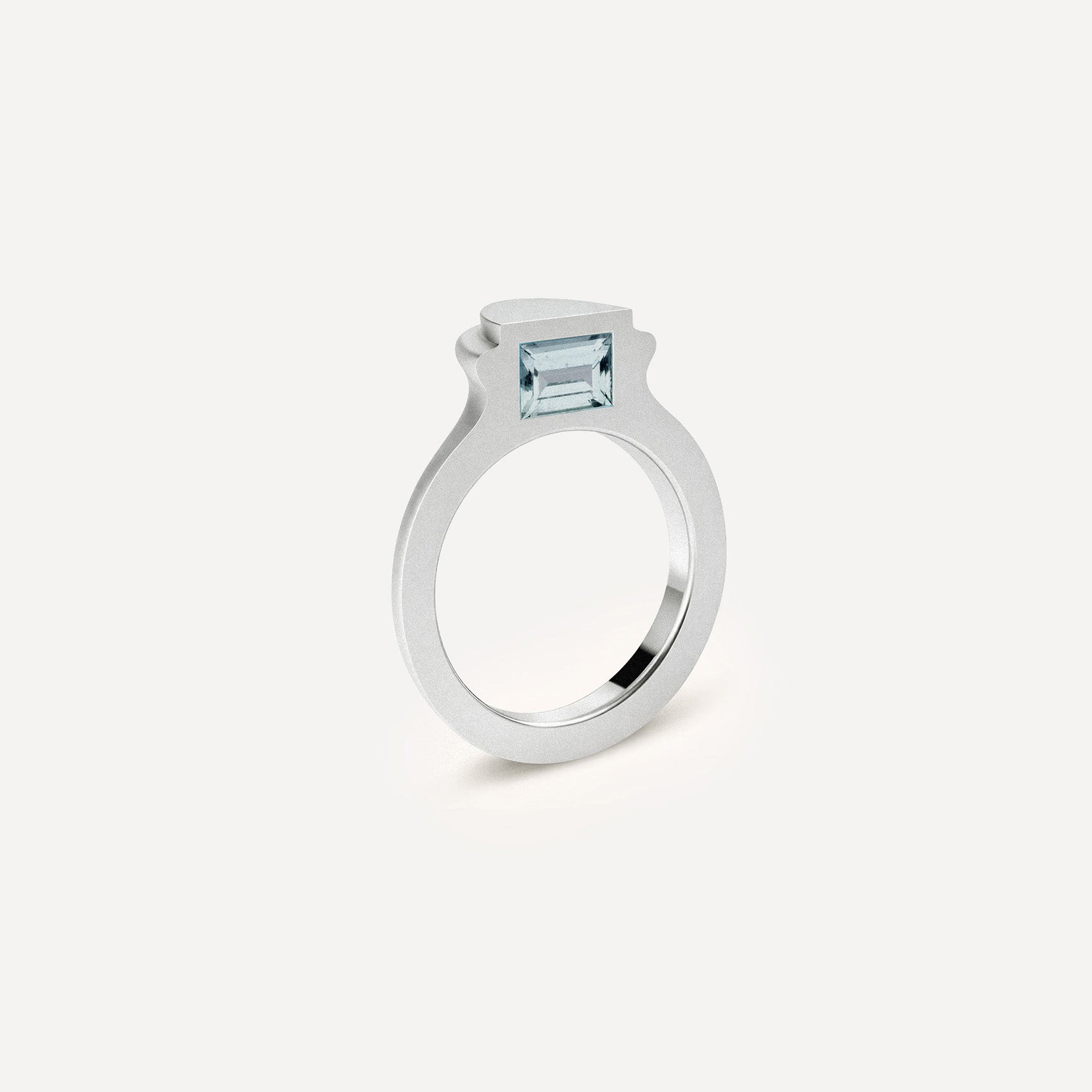 Silver signet ring with Blue Topaz on the side in 1 half of the ring.
