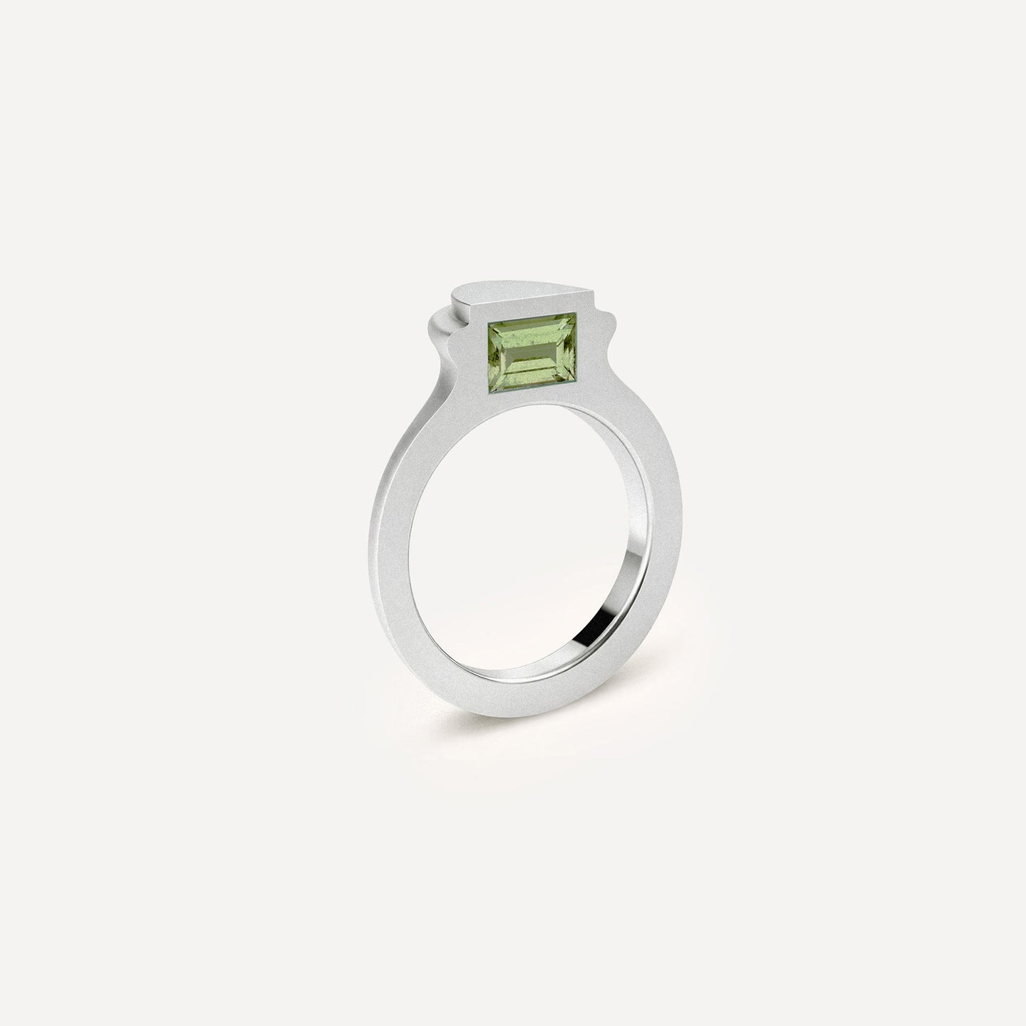 Silver signet ring with Peridot on the side in 1 half of the ring.