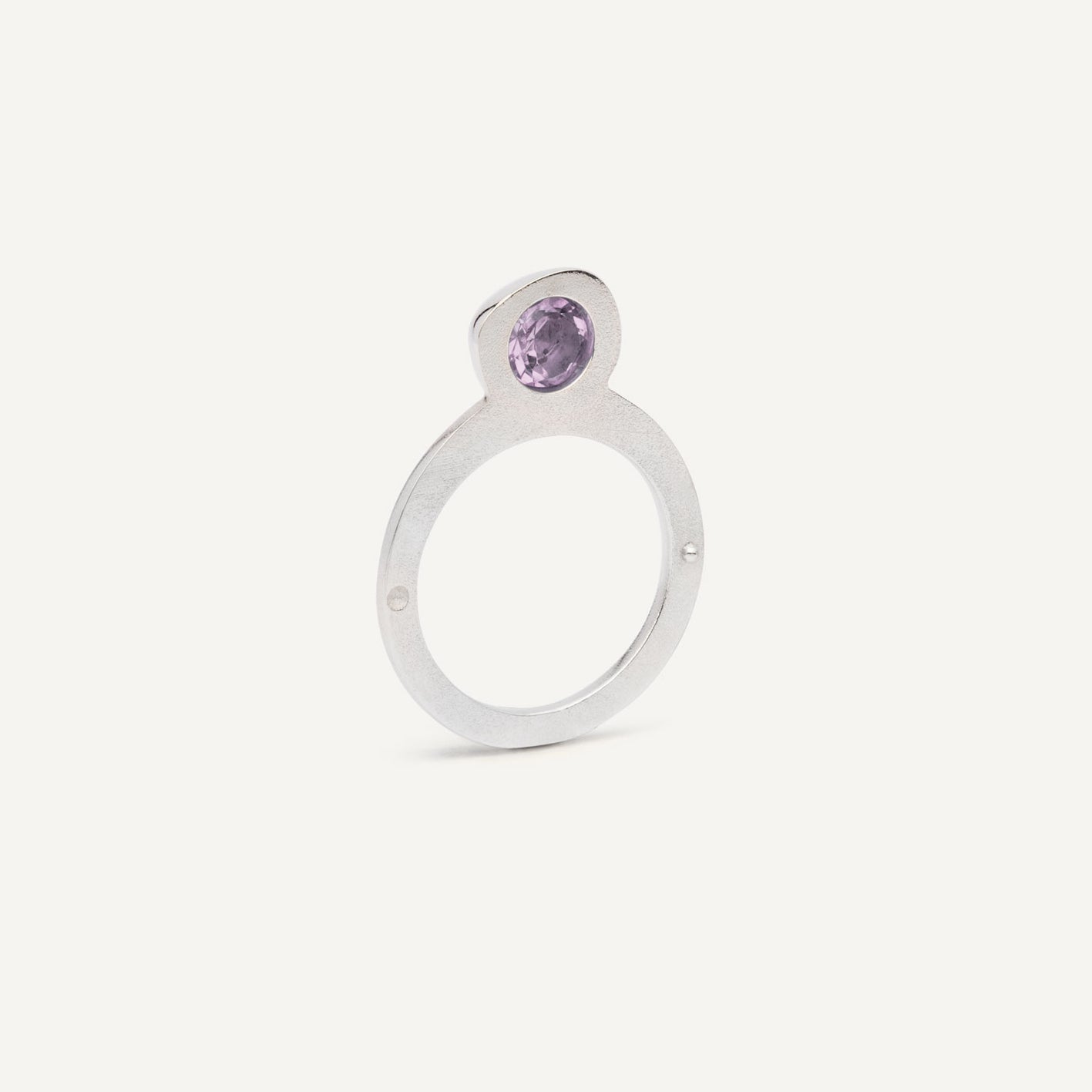 Silver signet ring with Amethyst in 1 half of the ring. 