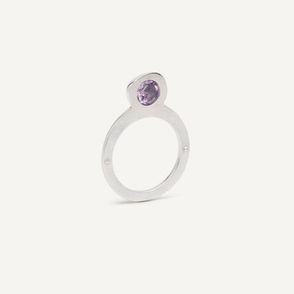 Silver signet ring with Amethyst in 1 half of the ring. 