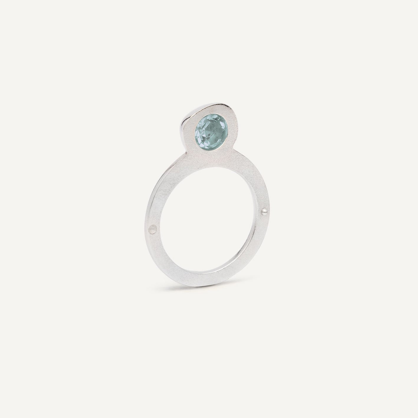 Silver signet ring with Blue Topaz in 1 half of the ring. 