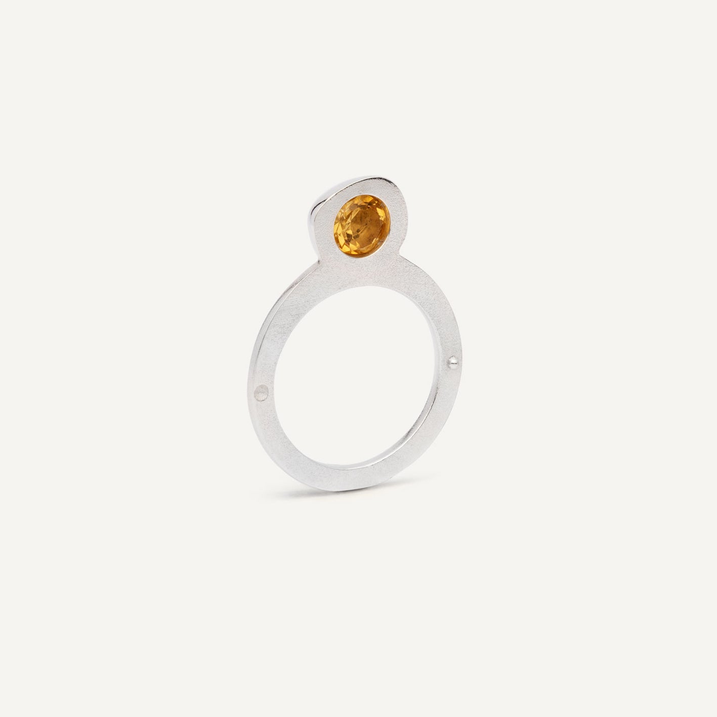 Silver signet ring with Orange Citrine in 1 half of the ring. 