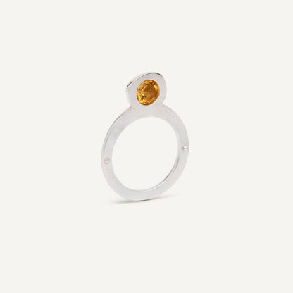 Silver signet ring with Orange Citrine in 1 half of the ring. 