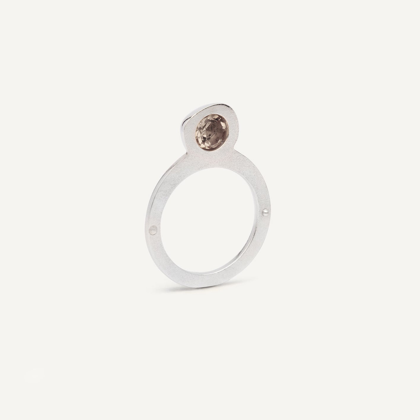 Silver signet ring with Smoky Quartz in 1 half of the ring. 