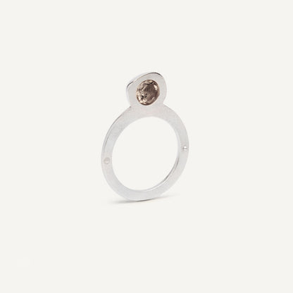 Silver signet ring with Smoky Quartz in 1 half of the ring. 