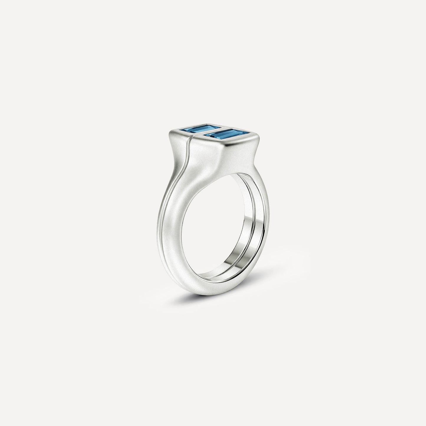 Silver signet ring with Blue Topaz and Rose Tourmaline in 2 halves of the ring. 