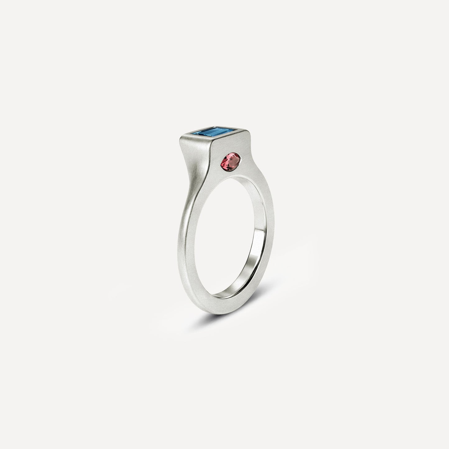 Silver signet ring with Blue Topaz and Rose Tourmaline in 2 halves of the ring. 