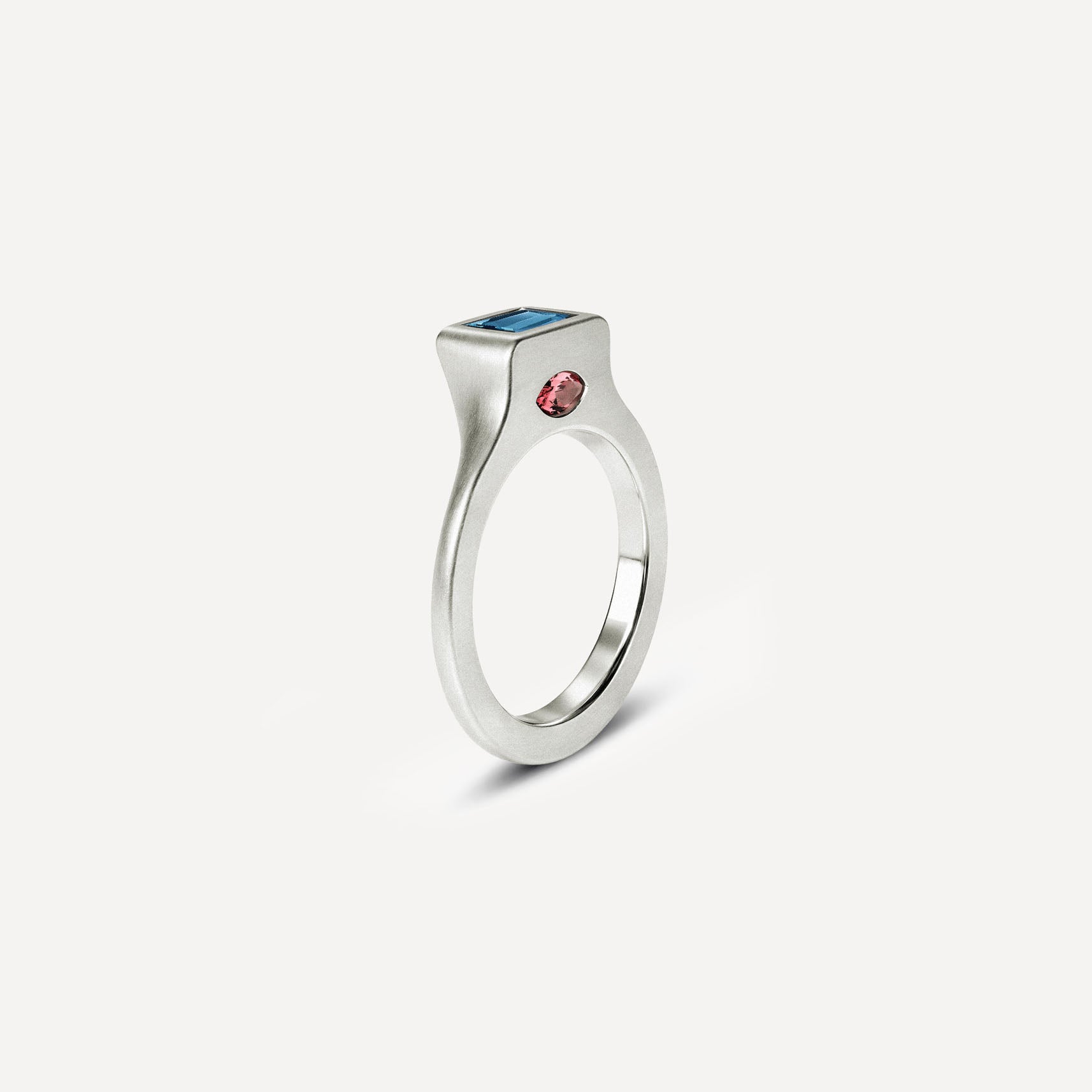 Silver signet ring with Blue Topaz and Rose Tourmaline in 2 halves of the ring. 