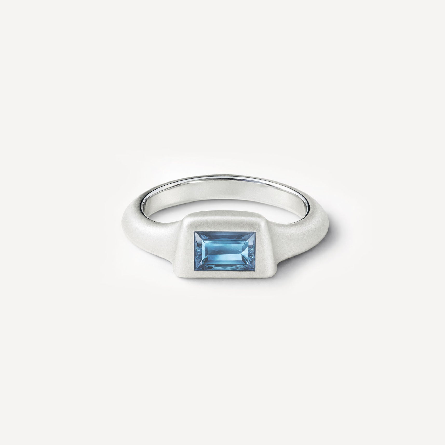 Silver signet ring with Blue Topaz and Rose Tourmaline in 2 halves of the ring. 