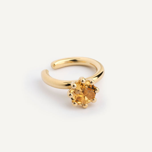 A ear cuff with yellow Citrine gemstone, made of 18k yellow gold plated silver. Handmade in Barcelona. No piercing needed. 