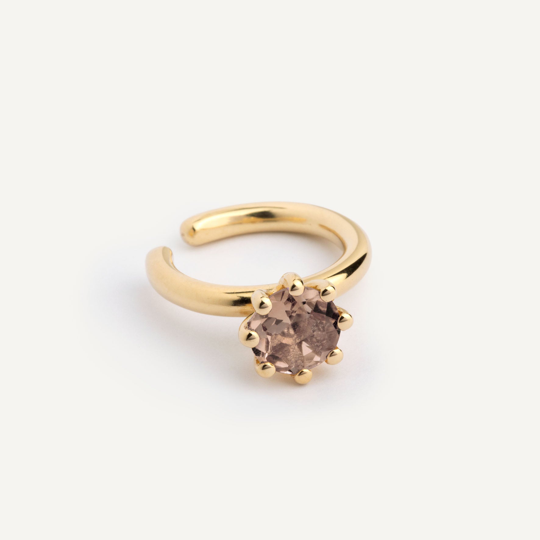 An ear cuff with Smoky Quartz gemstone, made of silver. Handmade in Barcelona. No piercing needed. 