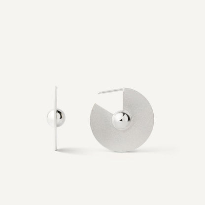 My version of silver hoops that embody simplicity and modernity — perfect for every day, when every day is special.
These earrings are about mental stillness, not silence. About focus without force. About this moment when you feel that you know without any doubts. 