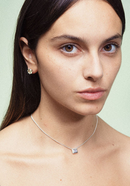 A pair of silver earrings featuring yellow Citrine gemstone, designed for everyday wear. Handmade in Barcelona. 