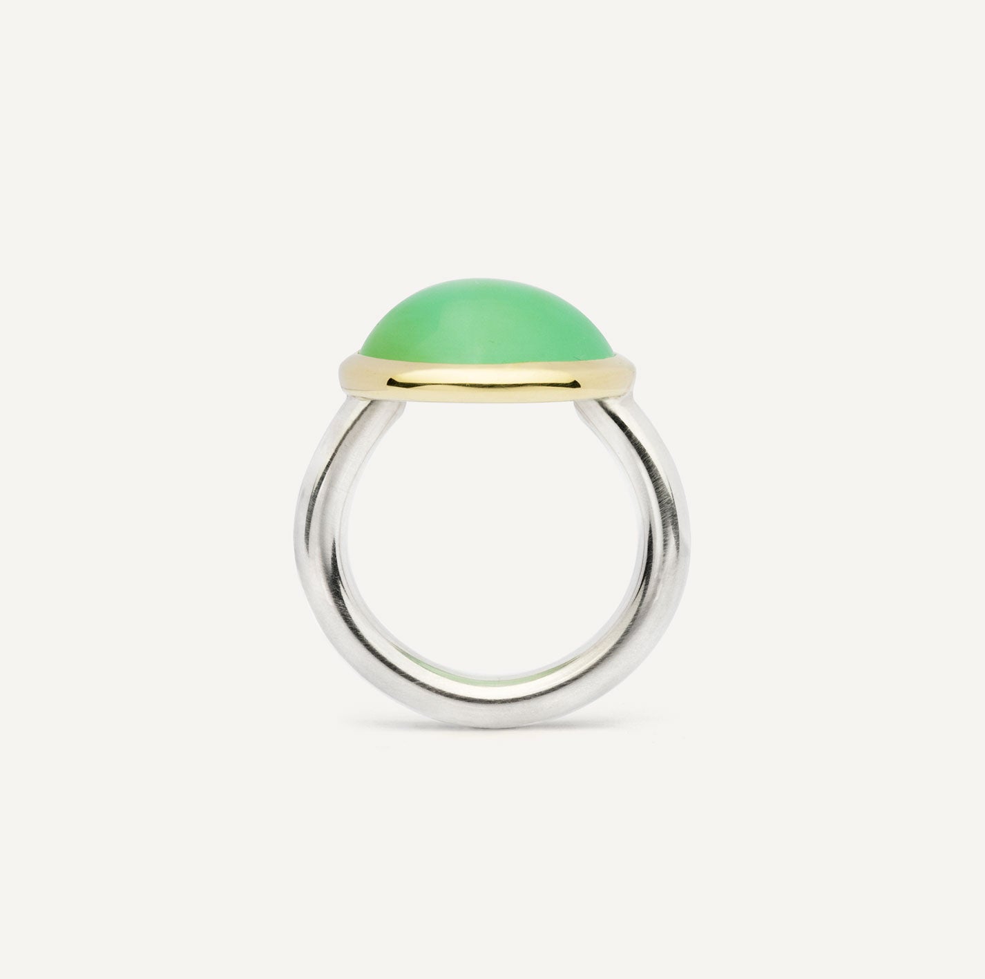 For this precious ring, I first found the gemstone — and only then made the ring. It consists out of soft, round shapes without sharp corners. The stone is set in warm 14K gold, giving it a quiet contrast I really like. Handmade piece of jewelry.