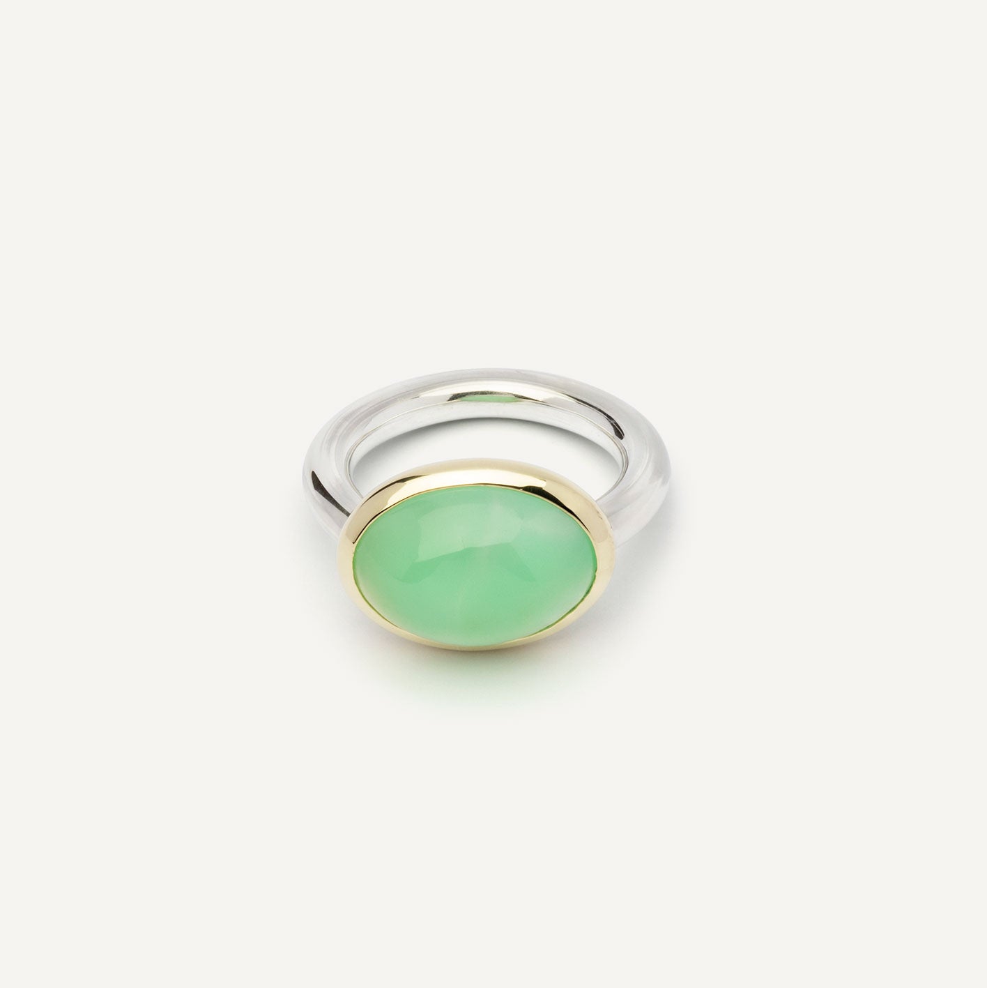 For this precious ring, I first found the gemstone — and only then made the ring. It consists out of soft, round shapes without sharp corners. The stone is set in warm 14K gold, giving it a quiet contrast I really like. Handmade piece of jewelry.