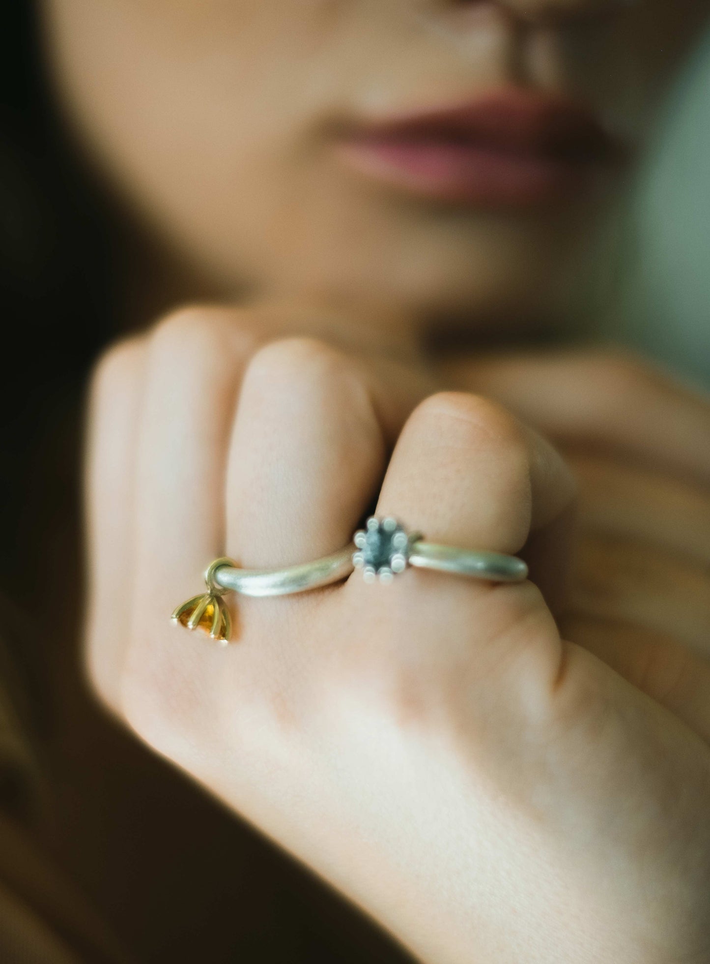I wanted to make a playful  silver ring using a combination of metals — a setting that doesn’t sit still. Here it is: an 18K gold setting with a gemstone that moves along the ring as you move your hand. 
