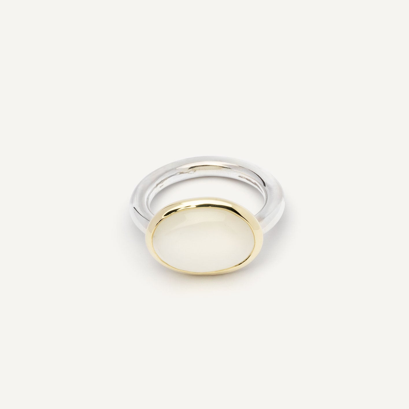 For this precious ring, I first found the gemstone — and only then made the ring. It consists out of soft, round shapes without sharp corners. The stone is set in warm 14K gold, giving it a quiet contrast I really like. Handmade piece of jewelry.