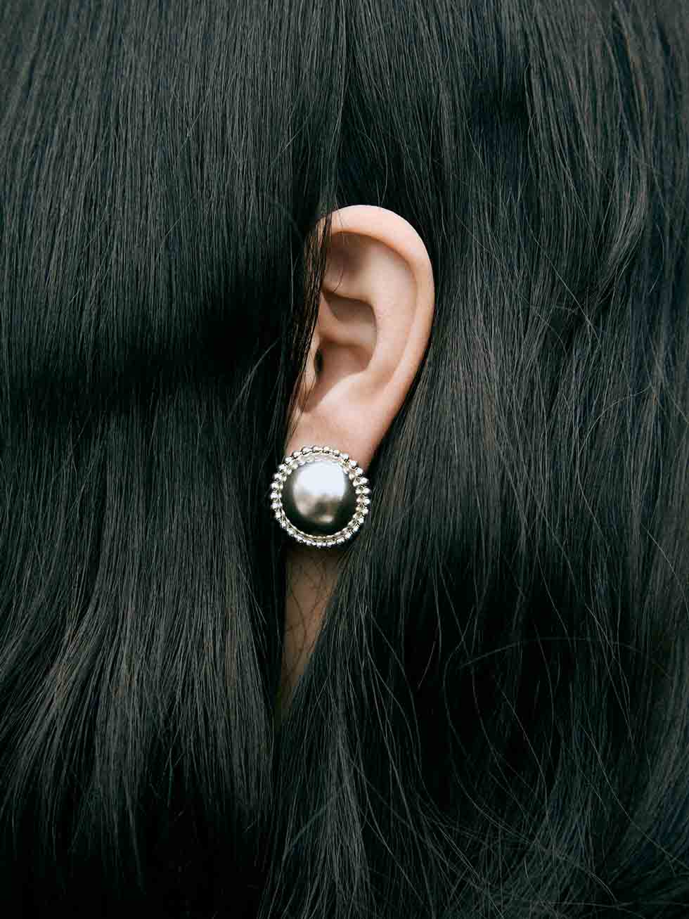 Silver half-sphere earrings designed to be worn every day. Handmade in Barcelona.
