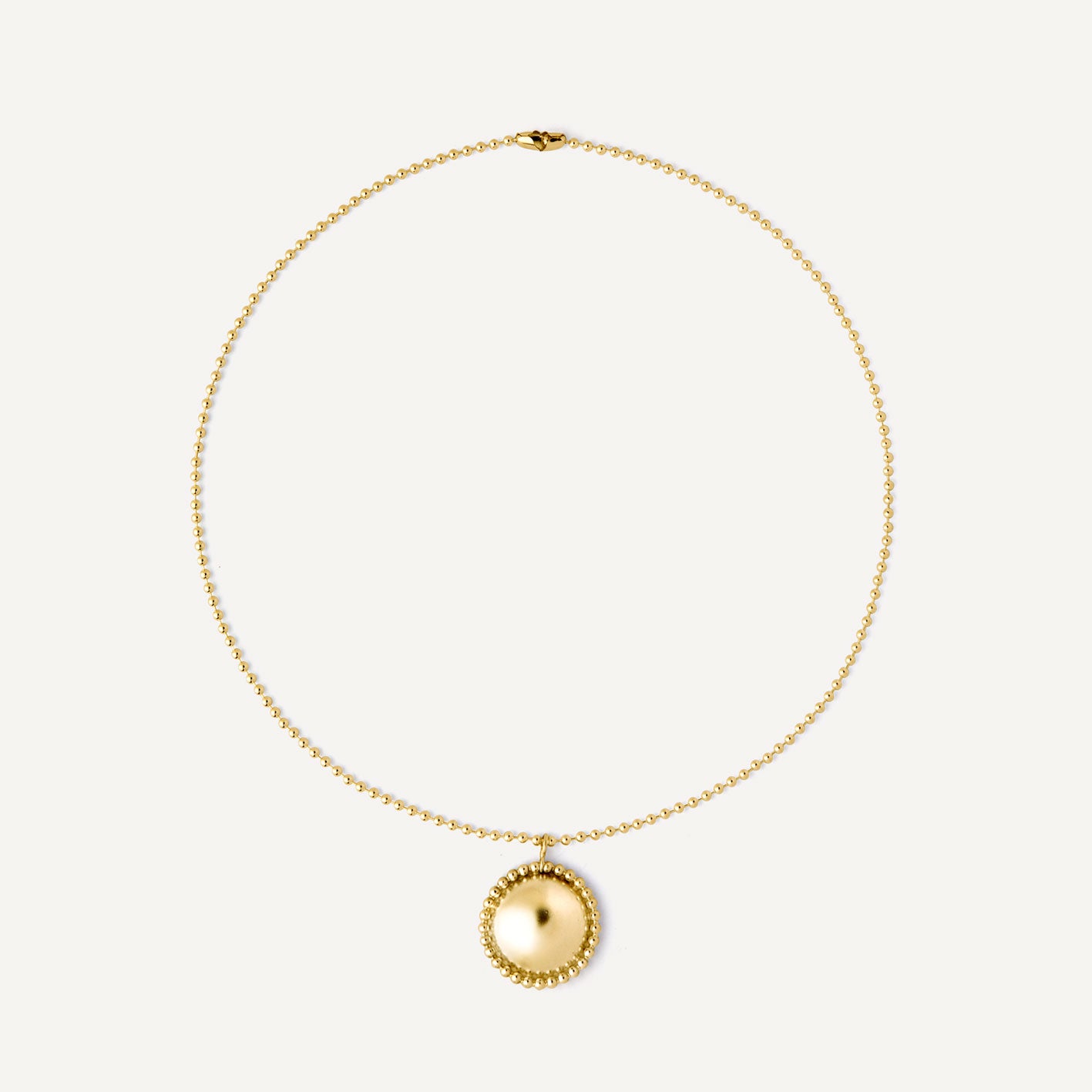 Gold plated silver half-sphere necklace designed to be worn every day. Handmade in Barcelona.