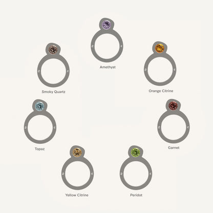 This silver ring is made of 2 parts. When it’s closed, it looks as if nothing’s happening. But when you open it — surprise — a hidden garden of gemstones inside. 