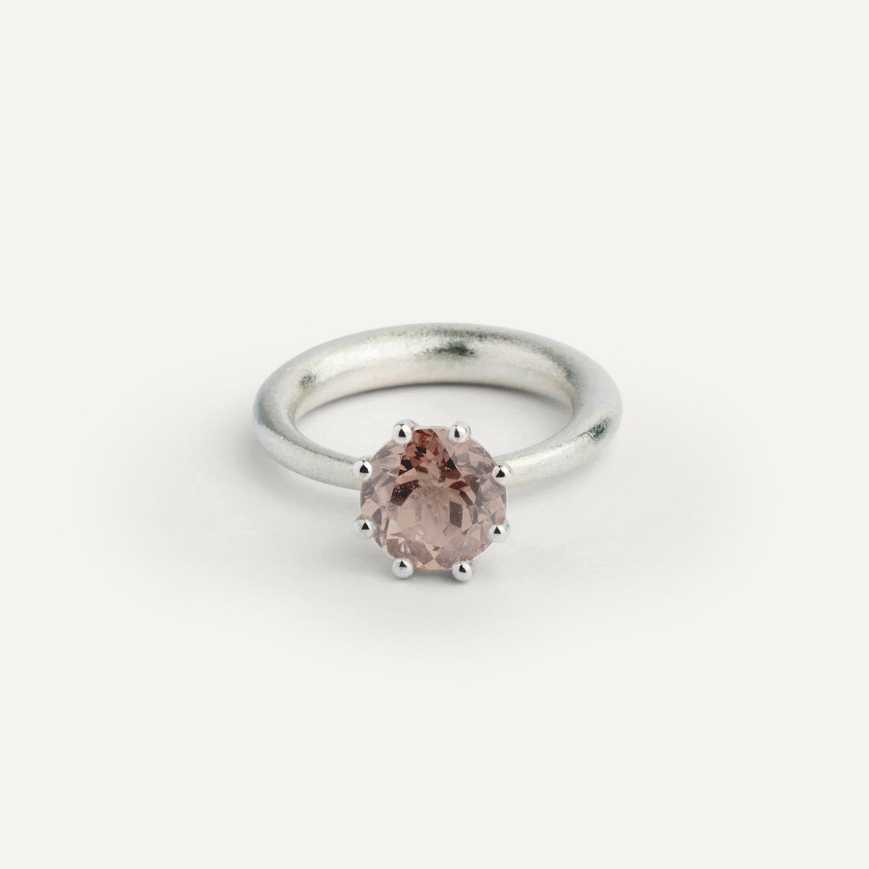 I wanted to create a silver ring with a surprise — and here it is: the setting with Smoky Quartz gemstone isn’t fixed to the ring. It moves along as you move your hand, quietly, almost with its own small rhythm. 