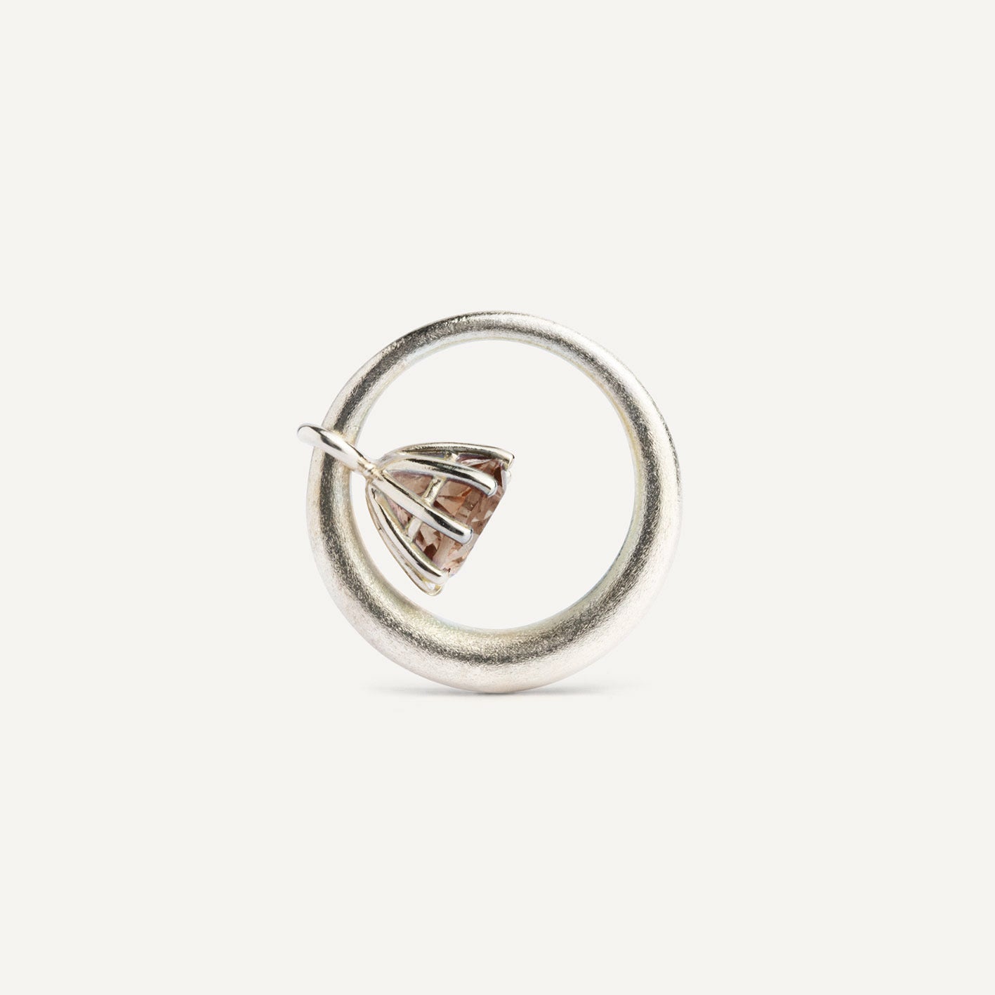 I wanted to create a silver ring with a surprise — and here it is: the setting with Smoky Quartz gemstone isn’t fixed to the ring. It moves along as you move your hand, quietly, almost with its own small rhythm. 