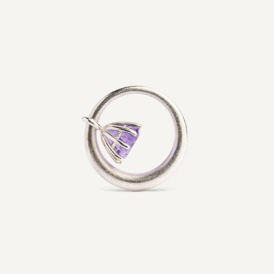 I wanted to create a silver ring with a surprise — and here it is: the setting with violet Amethyst gemstone isn’t fixed to the ring. It moves along as you move your hand, quietly, almost with its own small rhythm. 