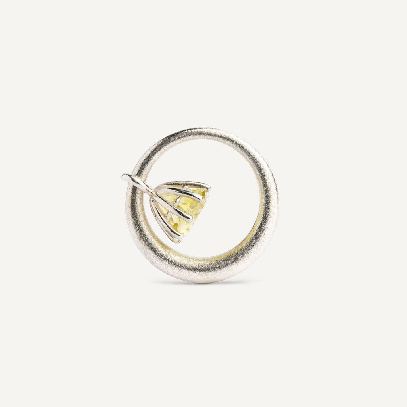 I wanted to create a silver ring with a surprise — and here it is: the setting with yellow Citrine gemstone isn’t fixed to the ring. It moves along as you move your hand, quietly, almost with its own small rhythm. 