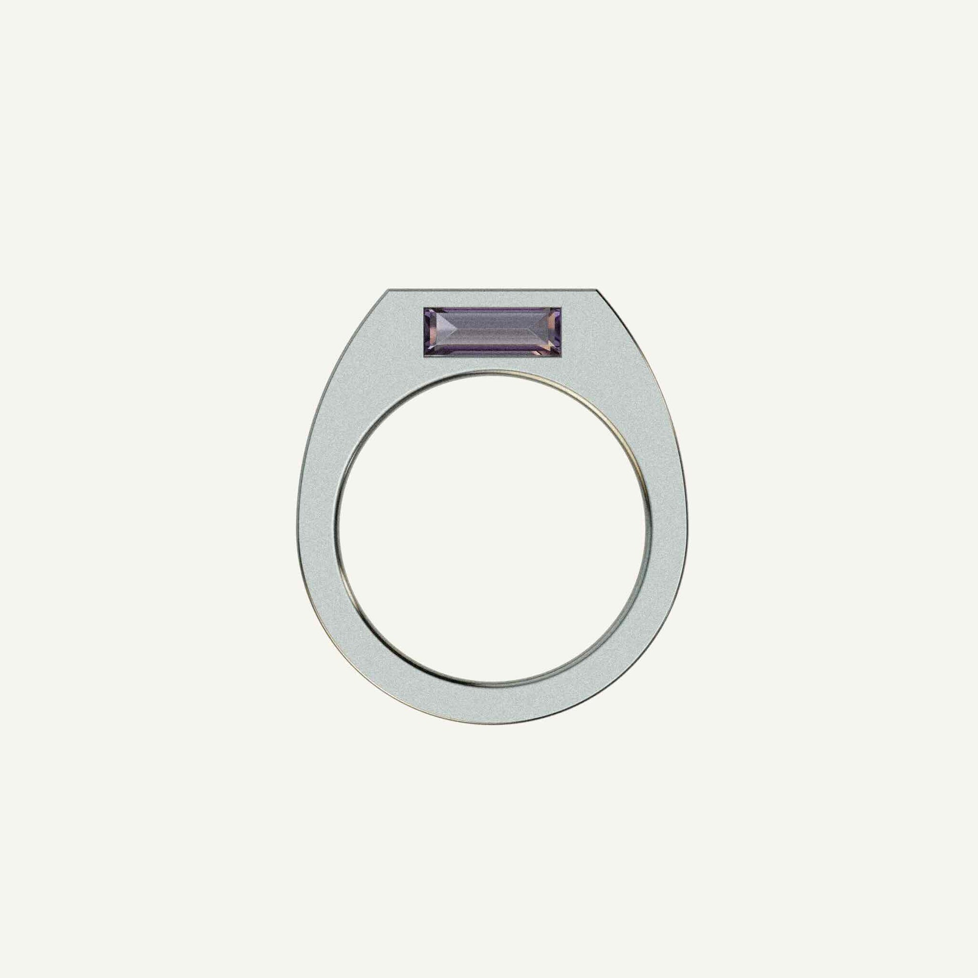 This silver signet ring is made of 2 parts. When it’s closed, it looks as if nothing’s happening. But when you open it — surprise — a hidden garden of gemstones inside. 